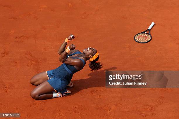 Serena Williams of United States of America celebrates match point in her Women's Singles Final match against Maria Sharapova of Russia during day...