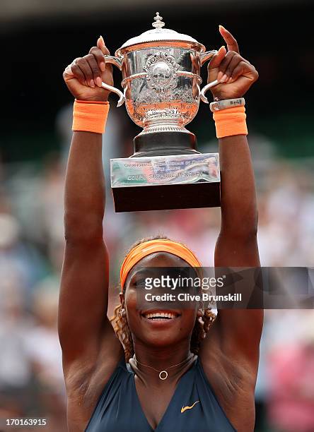 Serena Williams of United States of America lifts the Coupe Suzanne Lenglen after victory in the Women's Singles Final match against Maria Sharapova...