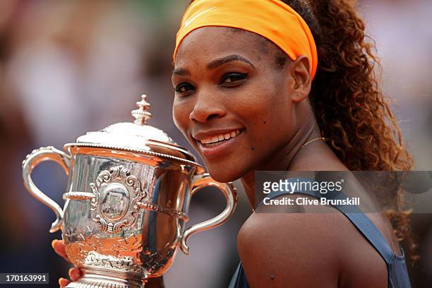 Serena Williams of United States of America poses with the Coupe Suzanne Lenglen after victory in the Women's Singles Final match against Maria...