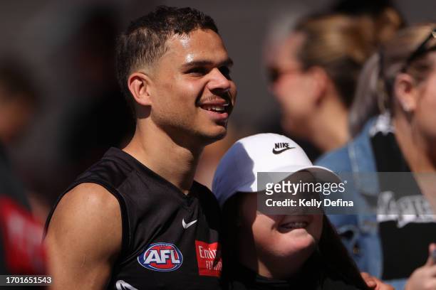 Bobby Hill of the Magpies meets fans during a Collingwood Magpies AFL training session at AIA Centre on September 26, 2023 in Melbourne, Australia.