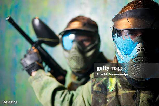 paintball players - paintball stock pictures, royalty-free photos & images