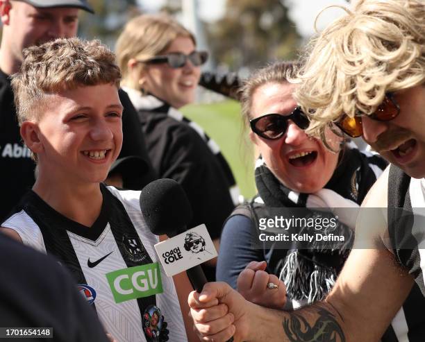 Coach Cole" interviews fans during a Collingwood Magpies AFL training session at AIA Centre on September 26, 2023 in Melbourne, Australia.