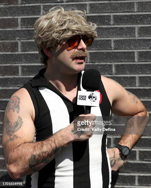 Coach Cole" interviews fans during a Collingwood Magpies AFL training session at AIA Centre on September 26, 2023 in Melbourne, Australia.