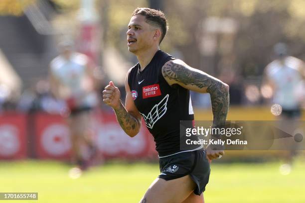 Bobby Hill of the Magpies runs during a Collingwood Magpies AFL training session at AIA Centre on September 26, 2023 in Melbourne, Australia.