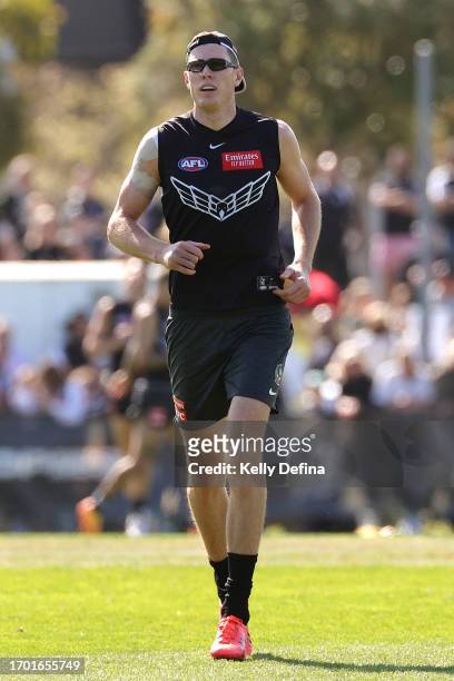 Mason Cox of the Magpies runs during a Collingwood Magpies AFL training session at AIA Centre on September 26, 2023 in Melbourne, Australia.