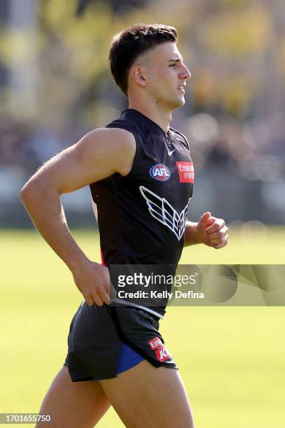 Nick Daicos of the Magpies runs during a Collingwood Magpies AFL training session at AIA Centre on September 26, 2023 in Melbourne, Australia.