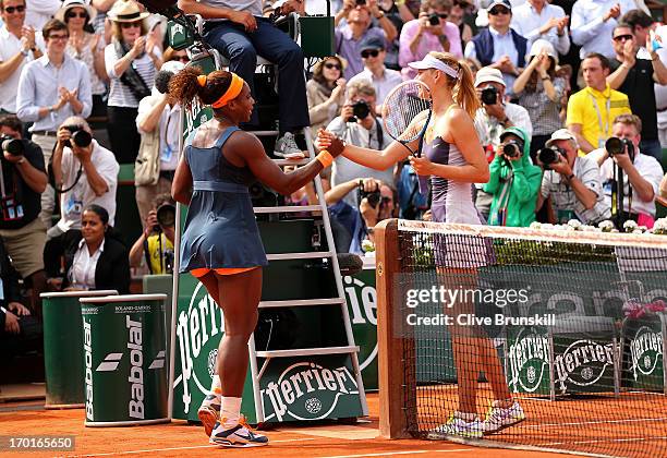 Serena Williams of United States of America shakes hands with Maria Sharapova of Russia after their Women's Singles Final match against Maria...