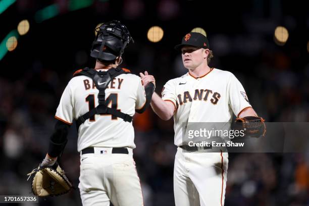 Logan Webb shakes hands with Patrick Bailey of the San Francisco Giants after they beat the San Diego Padres at Oracle Park on September 25, 2023 in...