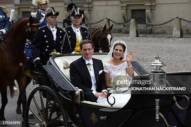 The newly wed Princess Madeleine of Sweden and Christopher O´Neill leave in a carriege on June 8, 2013 after the wedding ceremony at the royal palace...