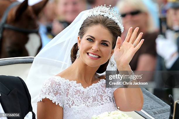 Princess Madeleine of Sweden is taken by horse and carriage from the Royal Palace of Stockholm to Riddarholmen after the wedding of Princess...