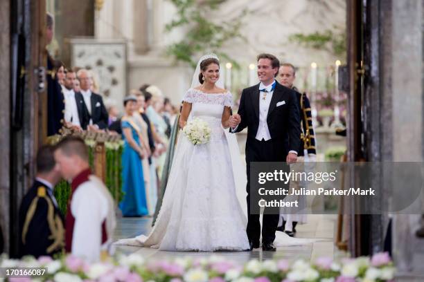 Princess Madeleine of Sweden and Christopher O'Neill leave the Royal Chapel at The Royal Palace in Stockholm after their Wedding on June 8, 2013 in...