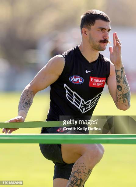 Oleg Markov of the Magpies warms up during a Collingwood Magpies AFL training session at AIA Centre on September 26, 2023 in Melbourne, Australia.