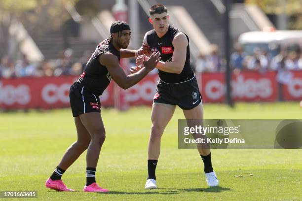 Isaac Quaynor of the Magpies and Brayden Maynard of the Magpies in action during a Collingwood Magpies AFL training session at AIA Centre on...