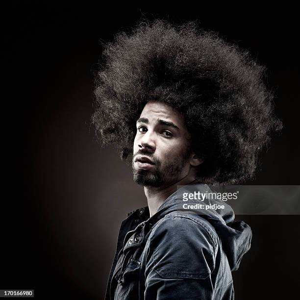 sad man with big afro hair - big beard stockfoto's en -beelden
