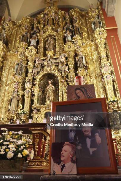 Images of Benito Castro are displayed in the church during a memorial service in honor to Benito Castro at Los Santos Castro y Damian church on...