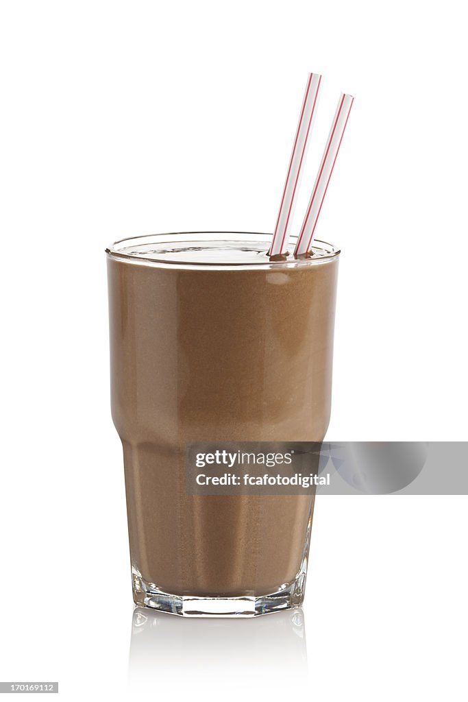 Chocolate milkshake glass against white background