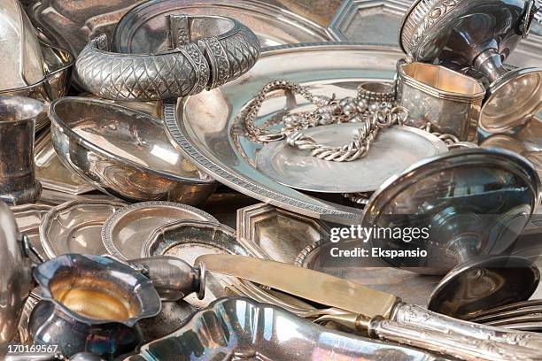 antique silverware and old silver jewelry background - silver bracelet stock pictures, royalty-free photos & images