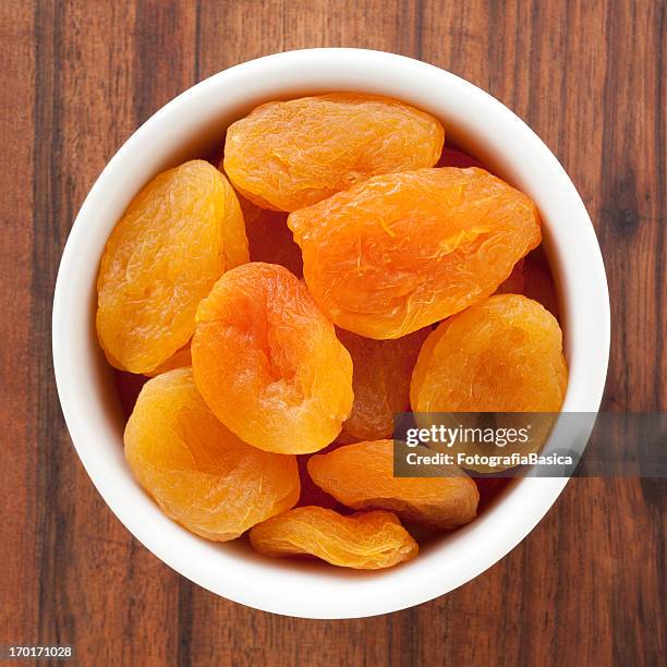 dried apricots - dried food stock pictures, royalty-free photos & images