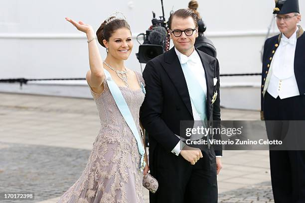 Crown Princess Victoria of Sweden and Prince Daniel of Sweden depart for the banquet after the wedding ceremony of Princess Madeleine of Sweden and...