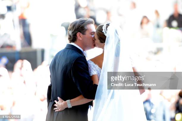 Princess Madeleine of Sweden and Christopher O'Neill kiss after their wedding hosted by King Carl Gustaf and Queen Silvia at The Royal Palace on June...