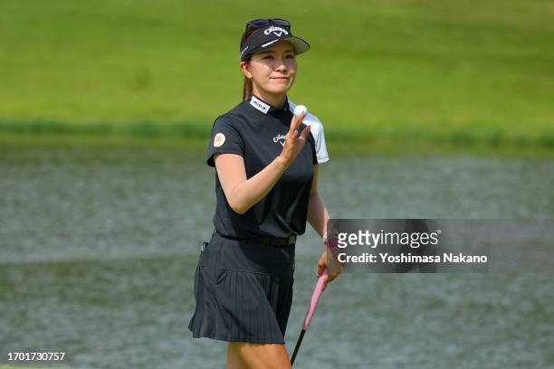 Hikari Fujita of Japan acknowledges the gallery after holing out on the 18th green during the first round of Sky Ladies ABC Cup at ABC Golf Club on...