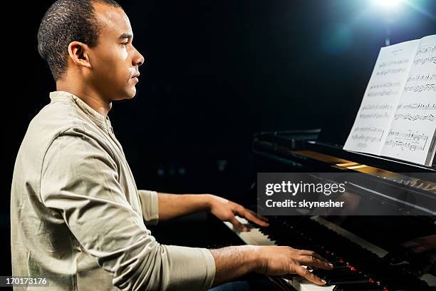 Black Man Playing Piano Photos and Premium High Res Pictures - Getty Images
