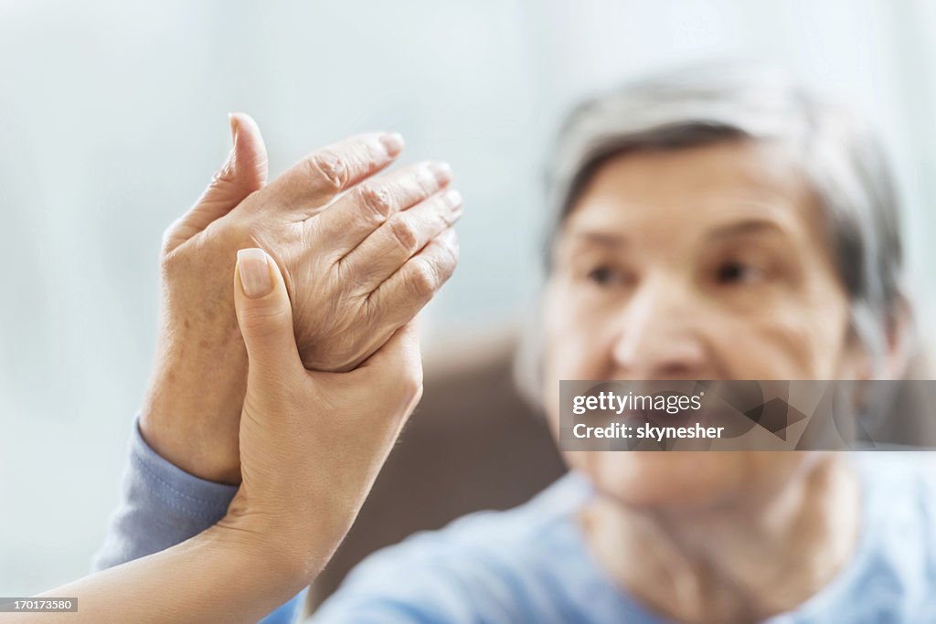 Senior woman having physical therapy.