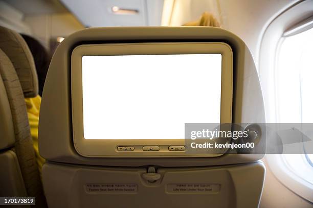 modern airplane - airplane seats stock pictures, royalty-free photos & images