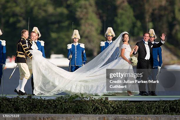 Princess Madeleine of Sweden, and Christopher O'Neill arrive at Drottningholm Palace to attend the evening banquet after their wedding, hosted by...