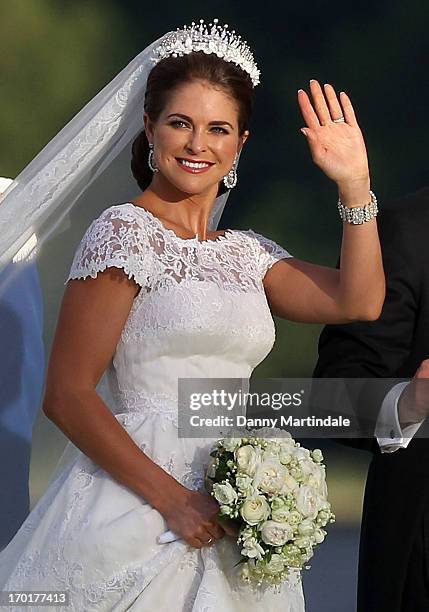 Princess Madeleine of Sweden attends the evening banquet after her wedding to Christopher O'Neill hosted by King Carl Gustaf and Queen Silvia at...