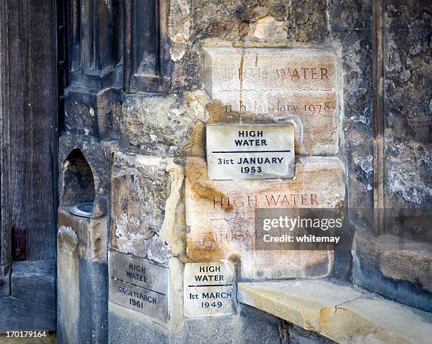 high water marks on king's lynn minster - king's lynn stock pictures, royalty-free photos & images