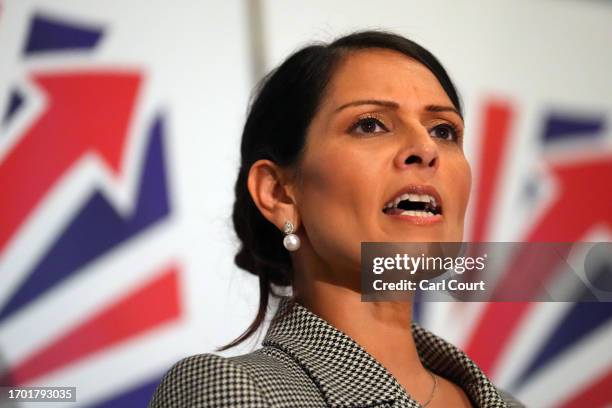 Britain's former Home Secretary, Priti Patel, speaks at the 'Great British Growth Rally' event on day two of the annual Conservative Party conference...