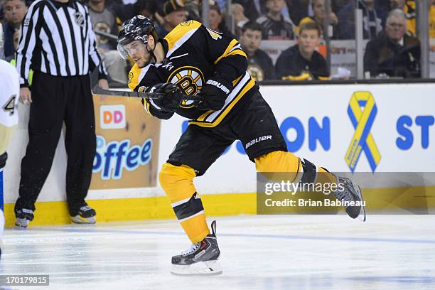 David Krejci of the Boston Bruins shoots the puck against the Pittsburgh Penguins in Game Four of the Eastern Conference Final during the 2013 NHL...