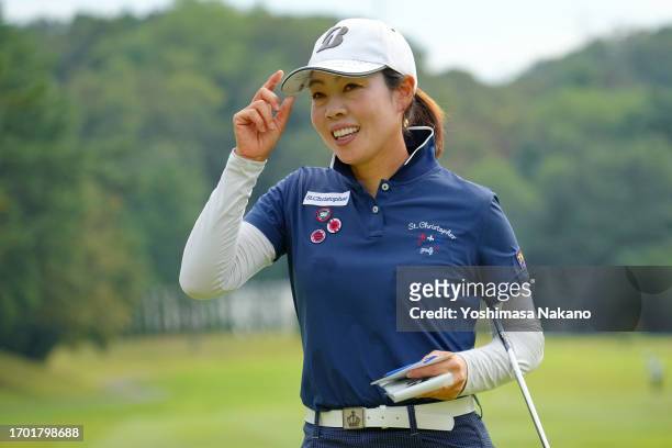 Yukari Nishiyama of Japan acknowledges the gallery after holing out on the 9th green during the first round of Sky Ladies ABC Cup at ABC Golf Club on...