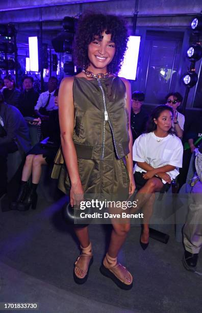 Indya Moore attends the Sacai Womenswear Spring/Summer 2024 show on October 2, 2023 in Paris, France.