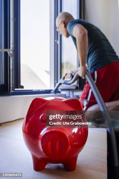 In this photo illustration A man is taking care about his Water bar from windowon September 30, 2023 in Bonn, Germany.