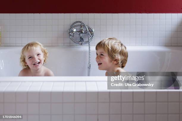 In this photo illustration children taking a bath on September 30, 2023 in Bonn, Germany.