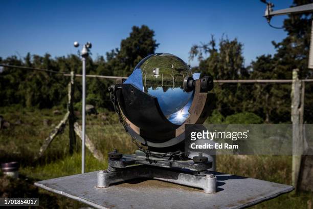 Device for measuring hours of sunlight is seen at the Meteorological Station on Mount Kenya on September 29, 2023 in Mount Kenya National Park,...