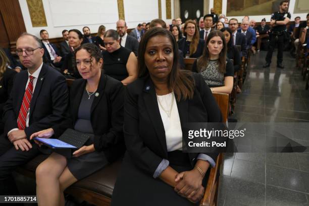 New York Attorney General Letitia James watches from the gallery as former U.S. President Donald Trump appears in the courtroom with his lawyers for...