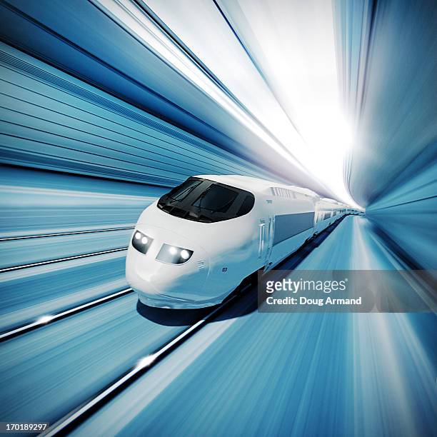 bildbanksillustrationer, clip art samt tecknat material och ikoner med a fast modern train speeding through a tunnel - tåg