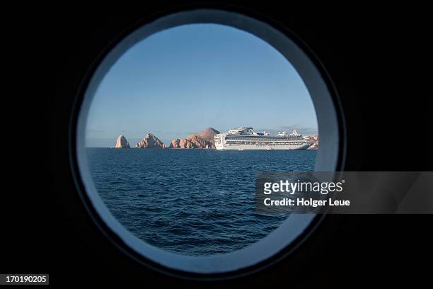 cruise ship sapphire princess through porthole - princess cruises stock pictures, royalty-free photos & images