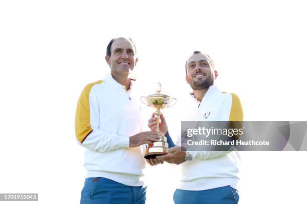 Edoardo Molinari and Francesco Molinari, Vice Captain's of Team Europe pose with the Ryder Cup trophy during the European Team Portraits at the 2023...