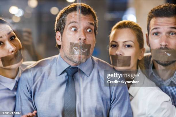 censored business team unable to say their opinions. - gagged stock pictures, royalty-free photos & images