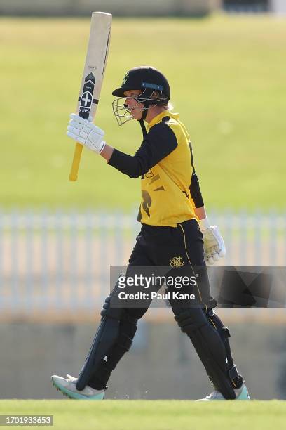 Mathilda Carmichael of Western Australia celebrates her half century during the WNCL match between Western Australia and Victoria at the WACA, on...