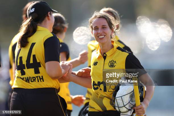 Chloe Piparo of Western Australia celebrates with team mates after winning the WNCL match between Western Australia and Victoria at the WACA, on...
