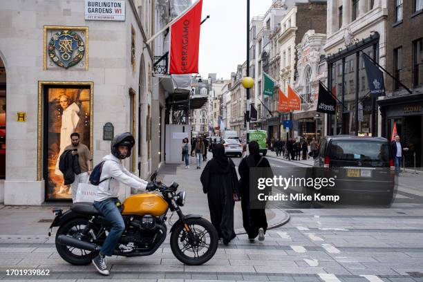 Street corner outside Ferragamo on Bond Street on 27th September 2023 in London, United Kingdom. Bond Street is one of the principal streets in the...