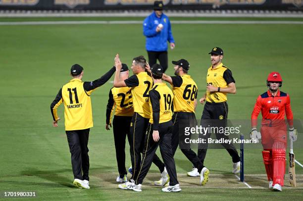Cameron Gannon of Western Australia celebrates with team mates after taking the wicket of Jake Fraser-McGurk of South Australia during the Marsh One...