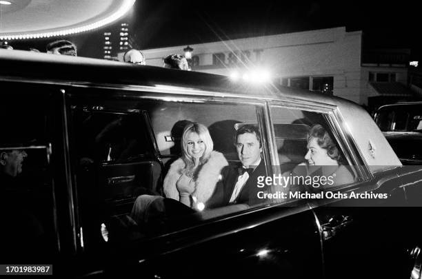 French actress Brigitte Bardot and her boyfriend, Brazilian film producer Bob Zagury, arrive for the Hollywood premiere of 'Viva Maria!', at the...
