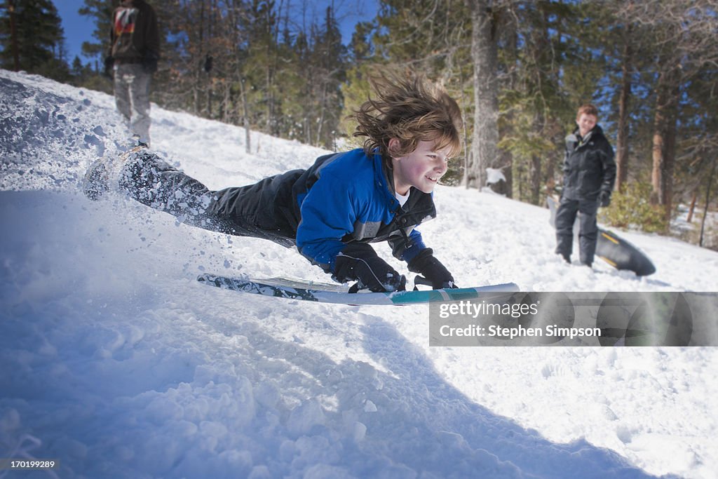 High risk, high speed, aerial snow play/sledding