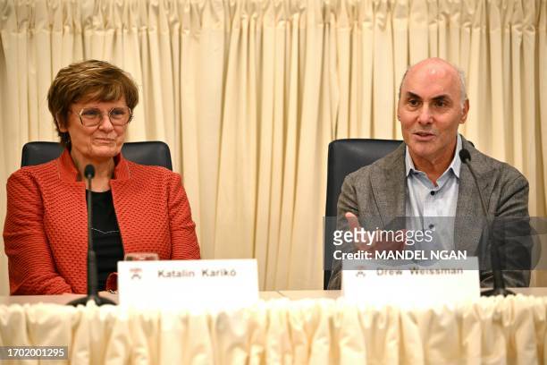 Dr. Katalin Kariko of Hungary and Dr. Drew Weissman of the US, who won the Nobel Medicine Prize, speak during a press conference at the University of...